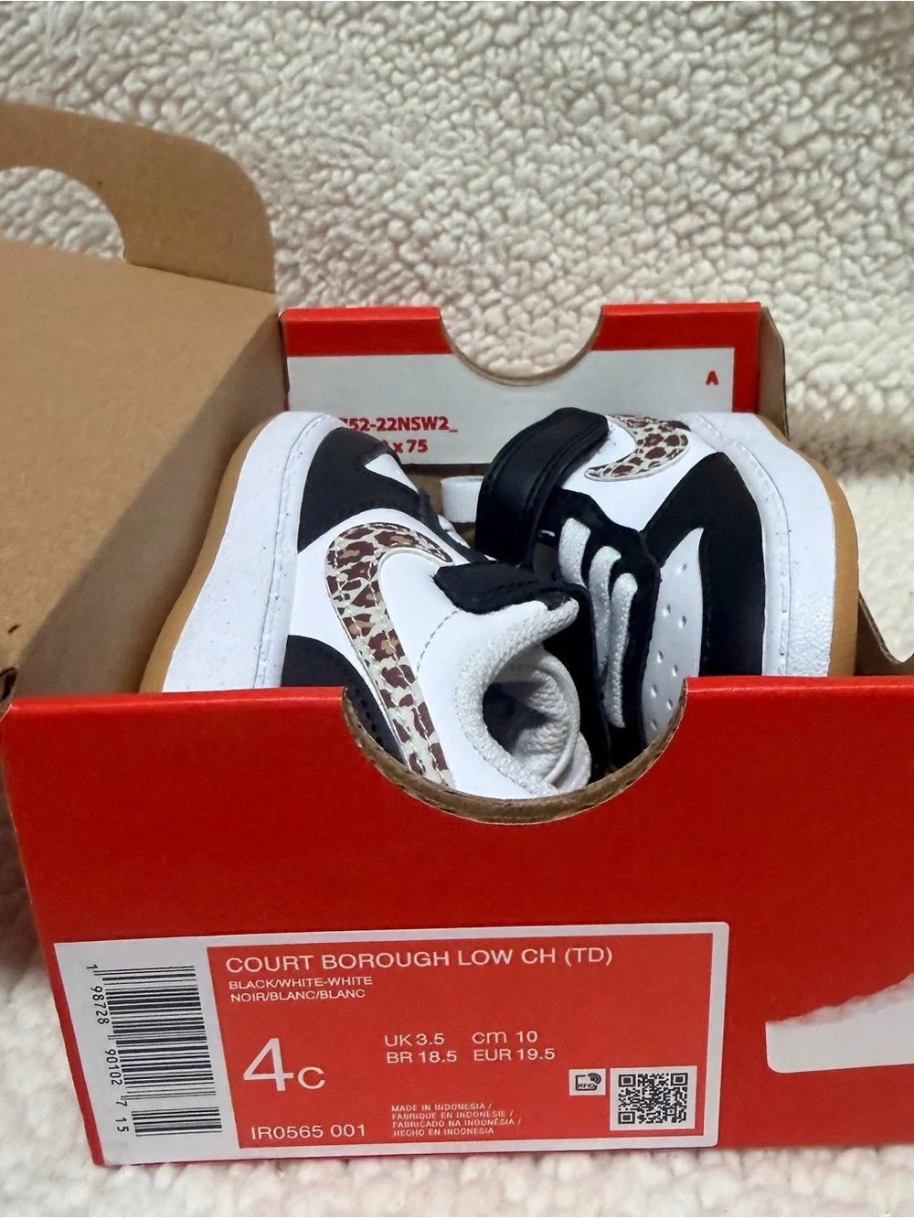 Nike Kids Black and White Sneakers with Leopard-Print Swoosh